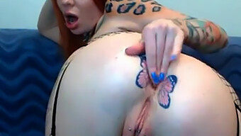 Fiery Redhead Gets Inked With Butterflies In A Steamy Webcam Session